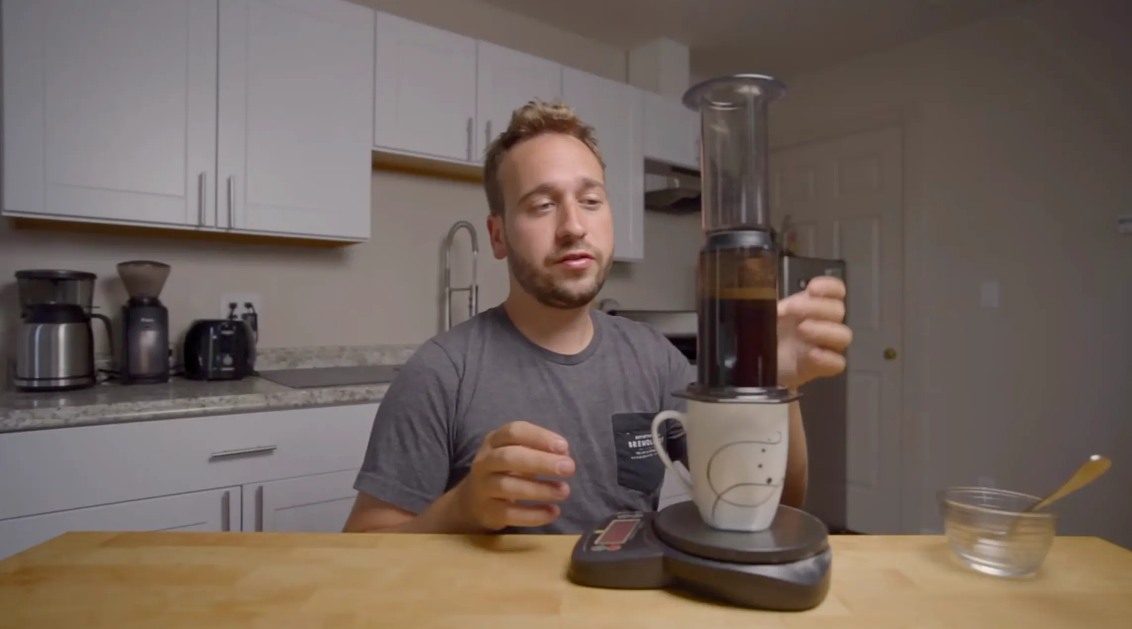 Steven testing AeroPress brewing technique